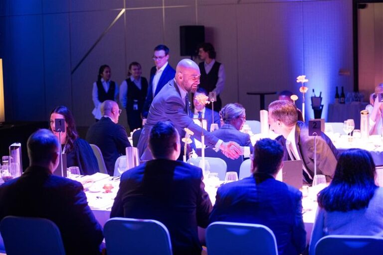Aveo Chief Executive, Tony Randello, shakes hands with the Hon. Simon Birmingham at the National Retirement Living Summit.